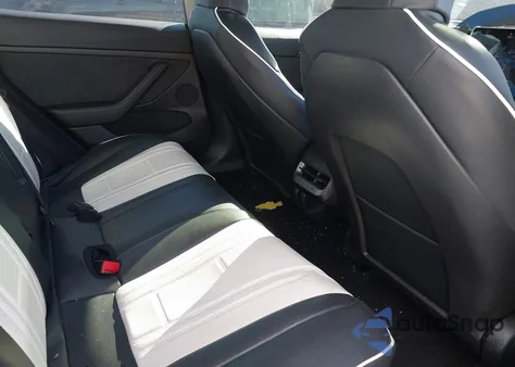 2022 Tesla Model 3 Rear-Wheel Drive from USA, damaged, VIN 5YJ3E1EA8NF189639